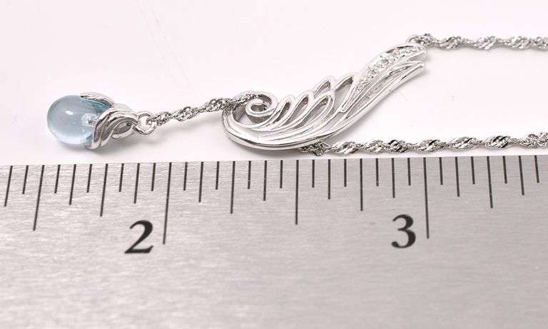 Blue Topaz Pendant Necklace In Sterling Silver