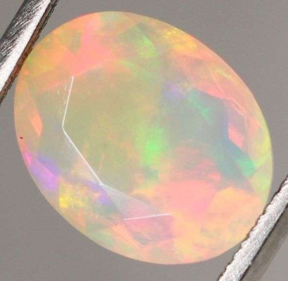 Gorgeous 2.01ct rainbow floral flashing jelly Opal