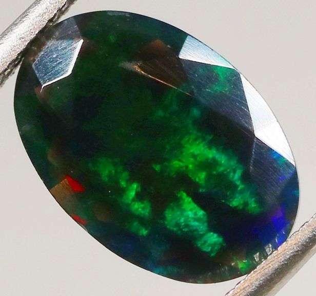 Fully faceted 1.50ct oval cut Black Opal