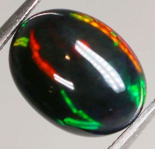 Captivating 2.04ct block flashing Black Opal