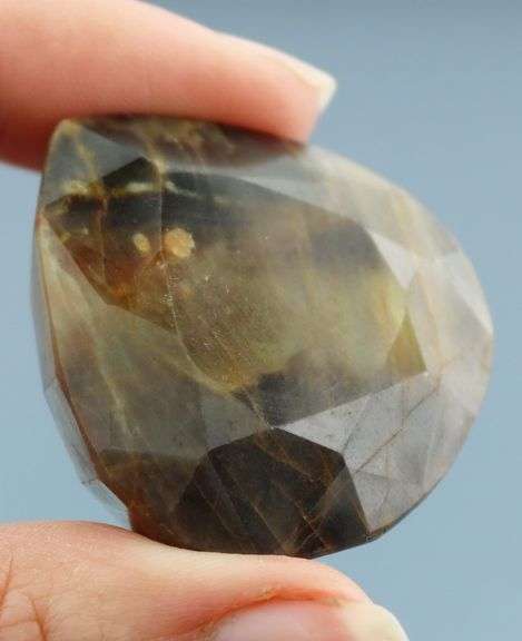 Large! 245ct earth toned faceted Sapphire