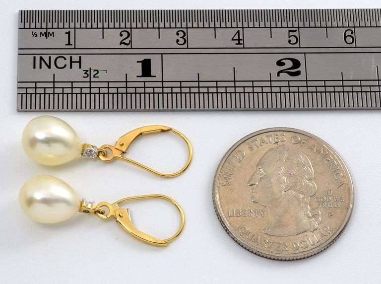 Feminine Lever Back Pear Shaped Pearl Earrings