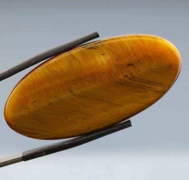 Full body shimmer! 49.27ct Golden Tiger Eye cabochon