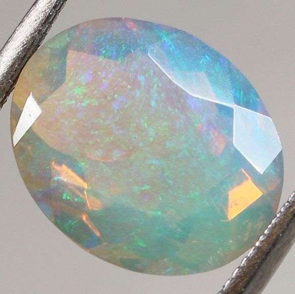 Gorgeous glittering 2.09ct faceted Jelly Opal