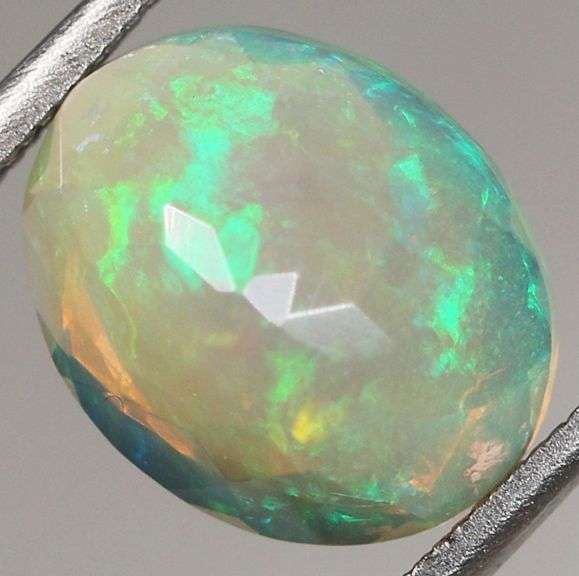 Gorgeous glittering 2.09ct faceted Jelly Opal