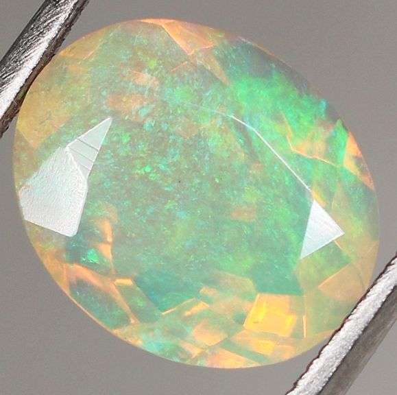 Gorgeous glittering 2.09ct faceted Jelly Opal