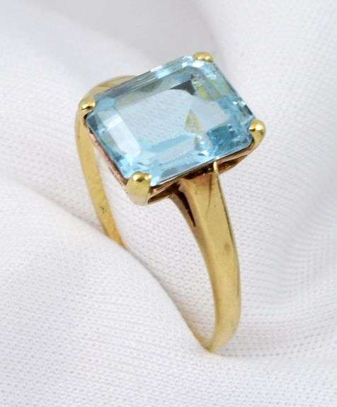 Tasteful Blue Topaz Solitaire