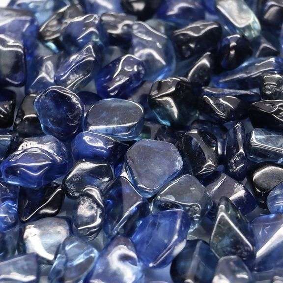Really heavy and richly colored 30.90ct Sapphire set