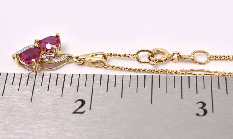 Angelic Ruby Heart Necklace In Yellow Gold