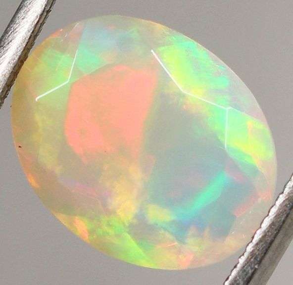 Gorgeous 2.01ct rainbow floral flashing jelly Opal