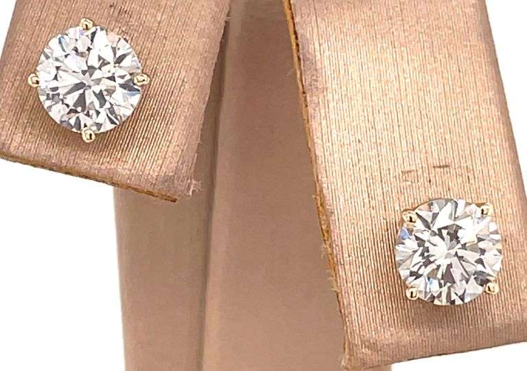 1.21 CARAT DIAMOND STUDS CRAFTED IN 14K YELLOW GOLD
