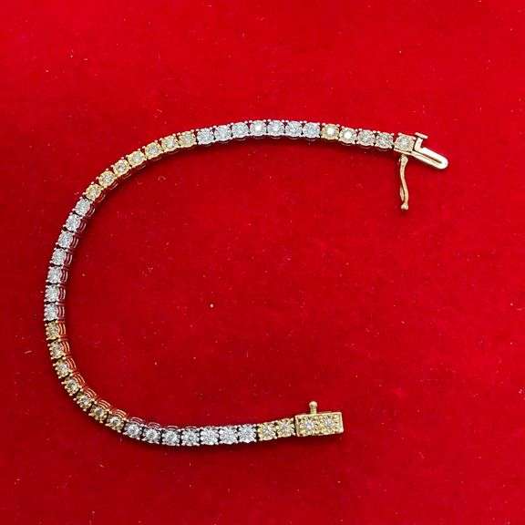 CERTIFIED 14K WHITE AND YELLOW GOLD DIAMOND TENNIS BRACELET. 1.25 CARAT
