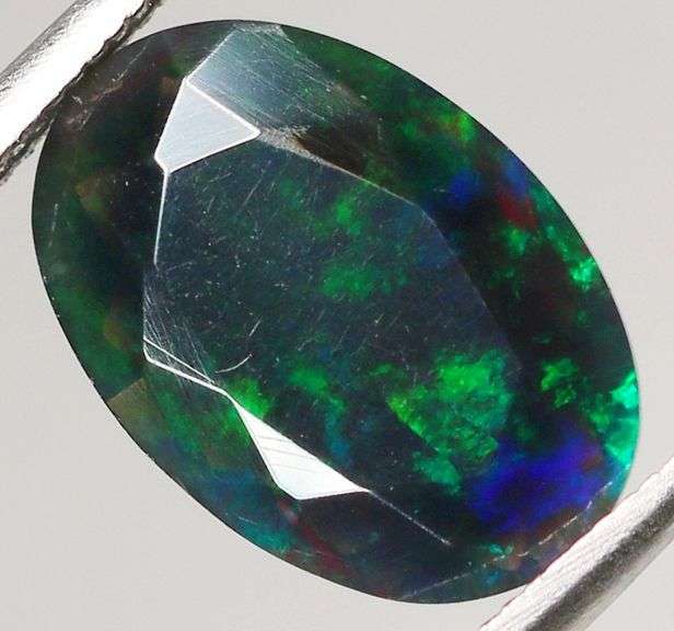 Fully faceted 1.50ct oval cut Black Opal