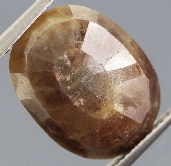 UNTREATED! Shimmering 13.97ct earth toned faceted Sapphire