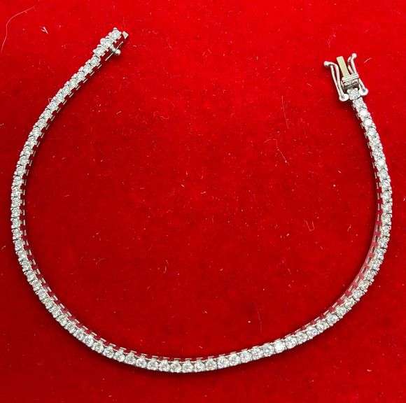 CERTIFIED BRAND NEW 14K WHITE GOLD AND DIAMOND TENNIS BRACELET. 3.30 CARATS