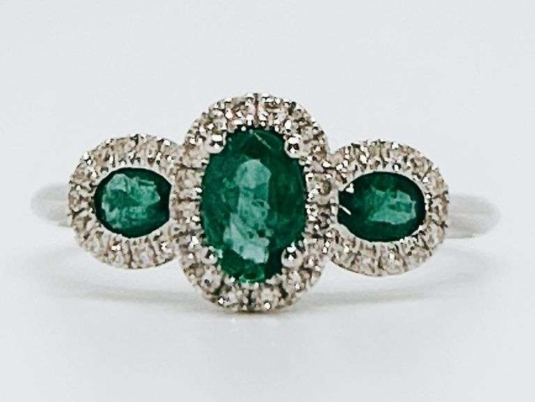 Beautiful Three-Stone Emerald 18k White Gold Ring edged with Sparkling Diamonds
