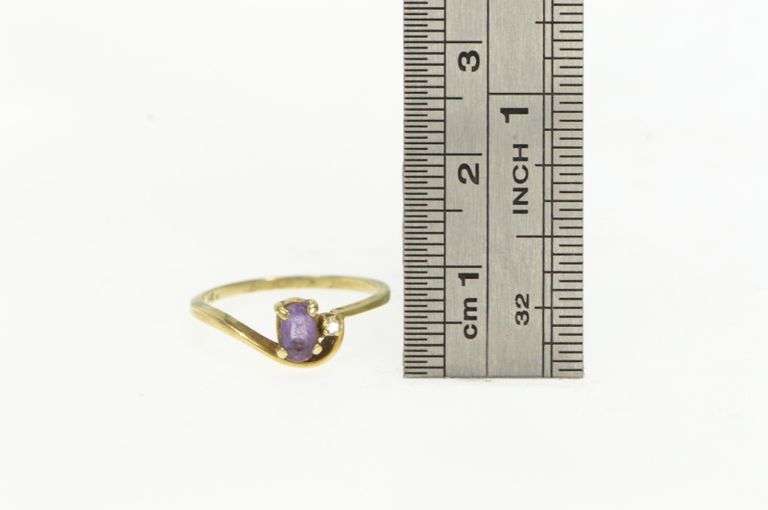14K Yellow Gold Oval Amethyst Diamond Accent Wavy Bypass Ring