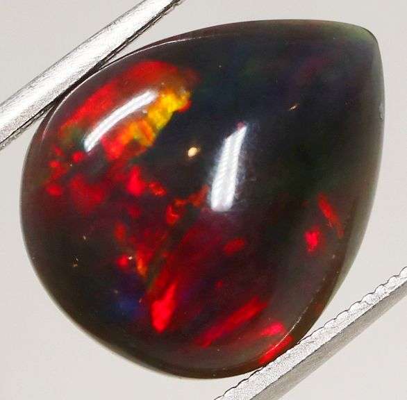 Glistening 2.73ct fiery flashing Welo Black Opal