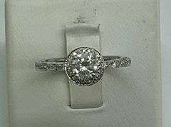 CERTIFIED BRAND NEW LADIES 18K WHITE GOLD AND DIAMOND RING