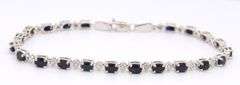 Attractive White Gold Blue Sapphire and Diamond Tennis Bracelet
