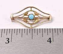 Adorable Turquoise Pin In Yellow Gold