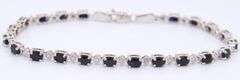 Attractive White Gold Blue Sapphire and Diamond Tennis Bracelet