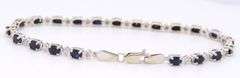 Attractive White Gold Blue Sapphire and Diamond Tennis Bracelet