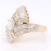 Dazzling Yellow Gold Marquois, Round and Baguette Diamond Ring