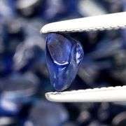 Really heavy and richly colored 30.90ct Sapphire set