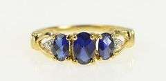 10K Yellow Gold Oval Three Stone Syn. Sapphire Diamond Ring