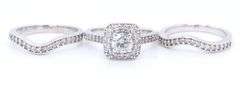 Elegant White Gold Round Brilliant Cut Diamond and Halo Wedding Set