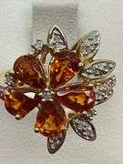 LADIES 10K YELLOW GOLD DIAMOND AND GARNET RING