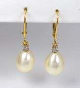 Feminine Lever Back Pear Shaped Pearl Earrings