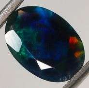 Eye catching 1.02ct floral patterned Black Opal