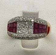 CERTIFIED LIMITED EDITION 18K GOLD DIAMONDS AND RUBBIES RING