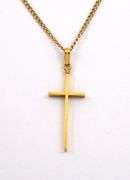 Tasteful Small Cross Pendant on Necklace