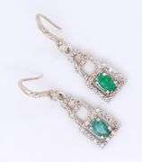 Charming White Gold oval Emerald and Diamond Dangle Earrings