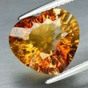 Concave flashing 6.41ct amber Imperial Topaz