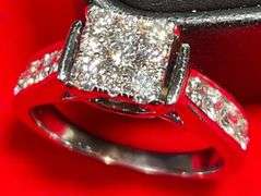CERTIFIED LADIES 14K WHITE GOLD AND DIAMOND RING