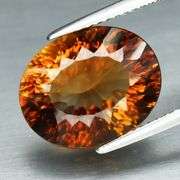 Fiery flashing 7.82ct amber Imperial Topaz