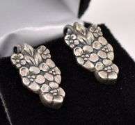 Flower Clip On Earrings In Sterling Silver