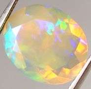Wonderful glittering 2.61ct faceted Jelly Opal