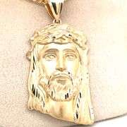 14K YELLOW GOLD JESUS FACE CHARM WITH CHAIN