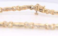 Elegant Yellow Gold XO Link Diamond Bracelet