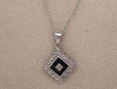 14K WHITE GOLD PENDANT