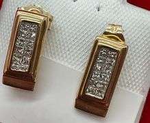LADIES 14K YELLOW GOLD AND DIAMOND STUD EARRINGS