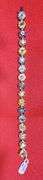 LADIES 14K YELLOW GOLD RAINBOW BRACELET WEIGHING A TOTAL OF 25.00 CARATS