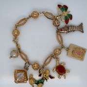 18K & 14K MIXED GOLD CHARM BRACELET