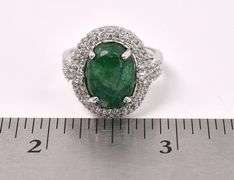 Brilliant 6.50CTS Oval Shaped Cabochon-Cut Emerald & 1.50CTW White Sapphire Ring in Sterling Silver