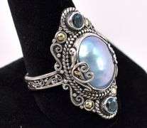 Pearl And Blue Topaz Ring In Sterling Silver